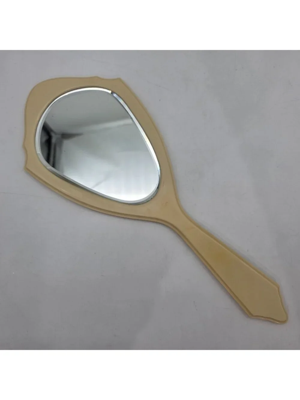 Vintage Ivory Celluloid Hand Mirror With Scalloped Edges by Lyra Lin Dubarry